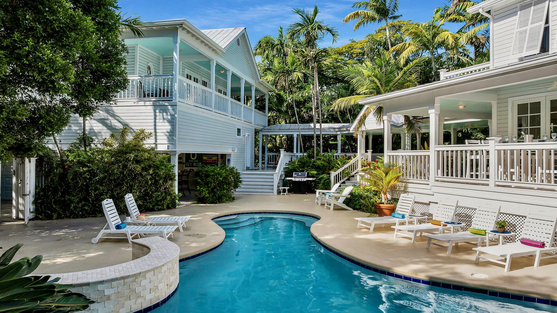 326 Caroline Street Key West, FL 33040 - Photo 18 of 47 a view of a house with patio