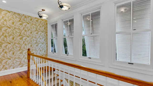 a view of a windows and a ceiling fan