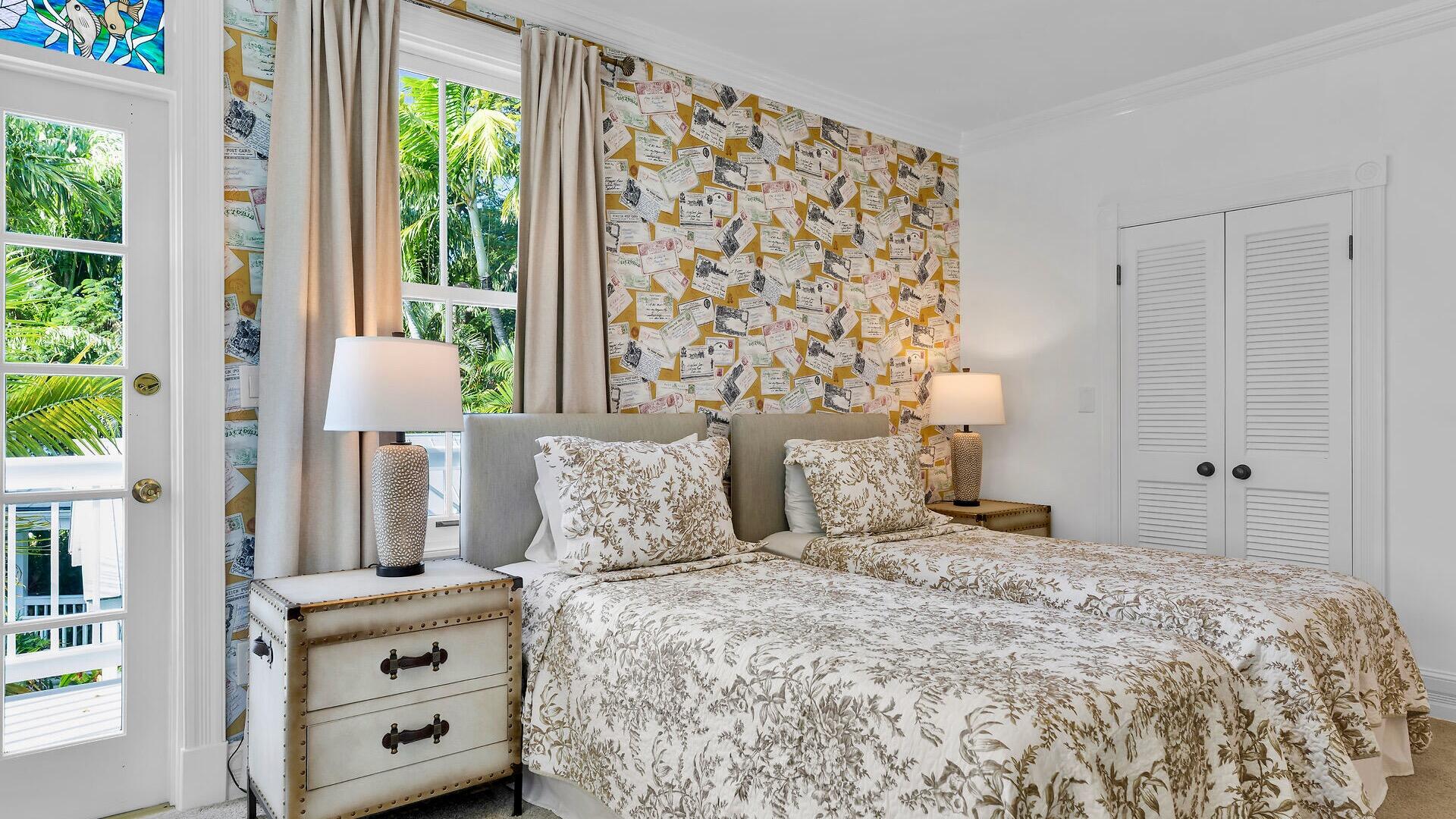 326 Caroline Street Key West, FL 33040 - Photo 28 of 47 a bedroom with a large bed and a window