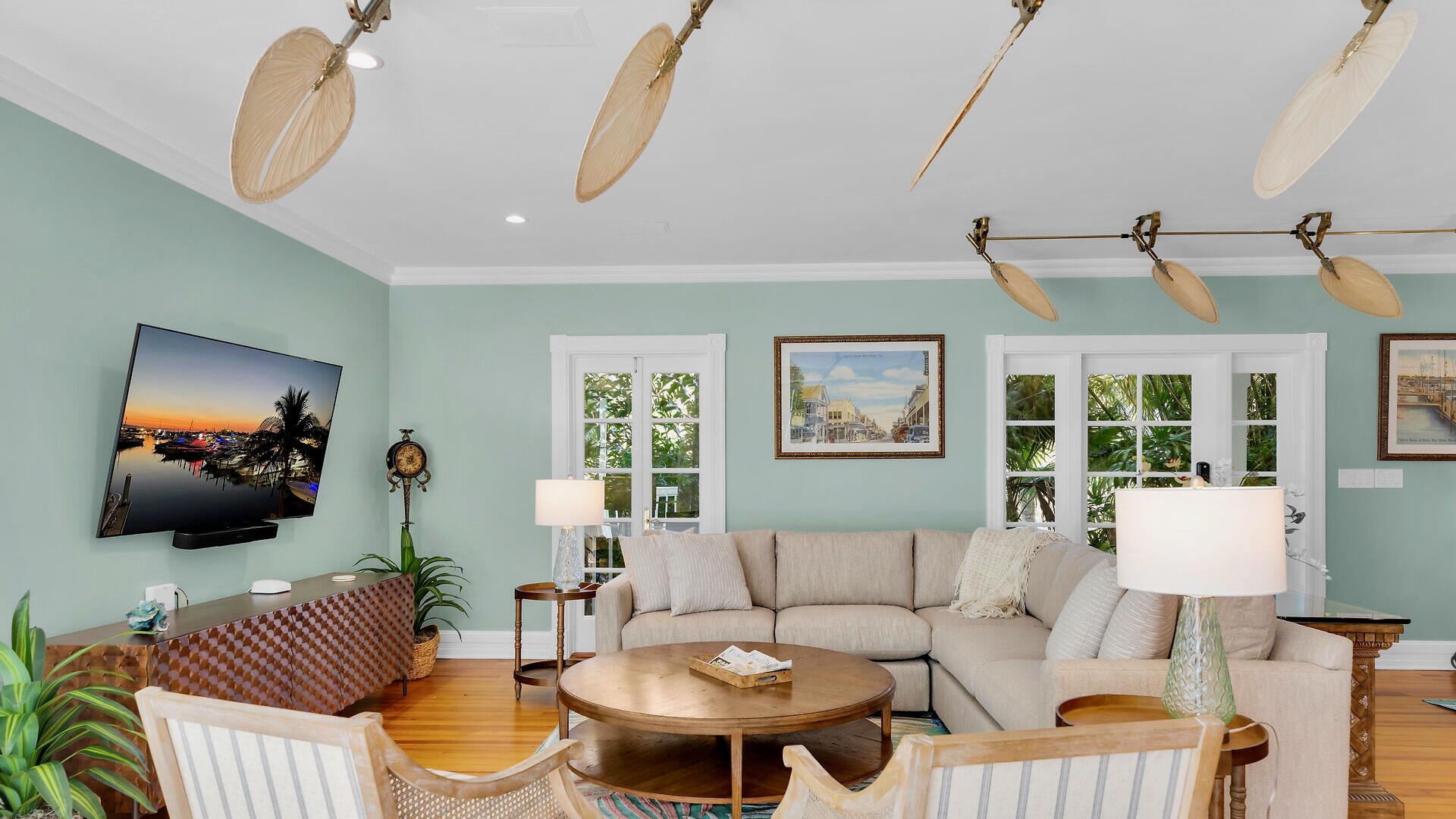 326 Caroline Street Key West, FL 33040 - Photo 4 of 47 a living room with furniture and a large window