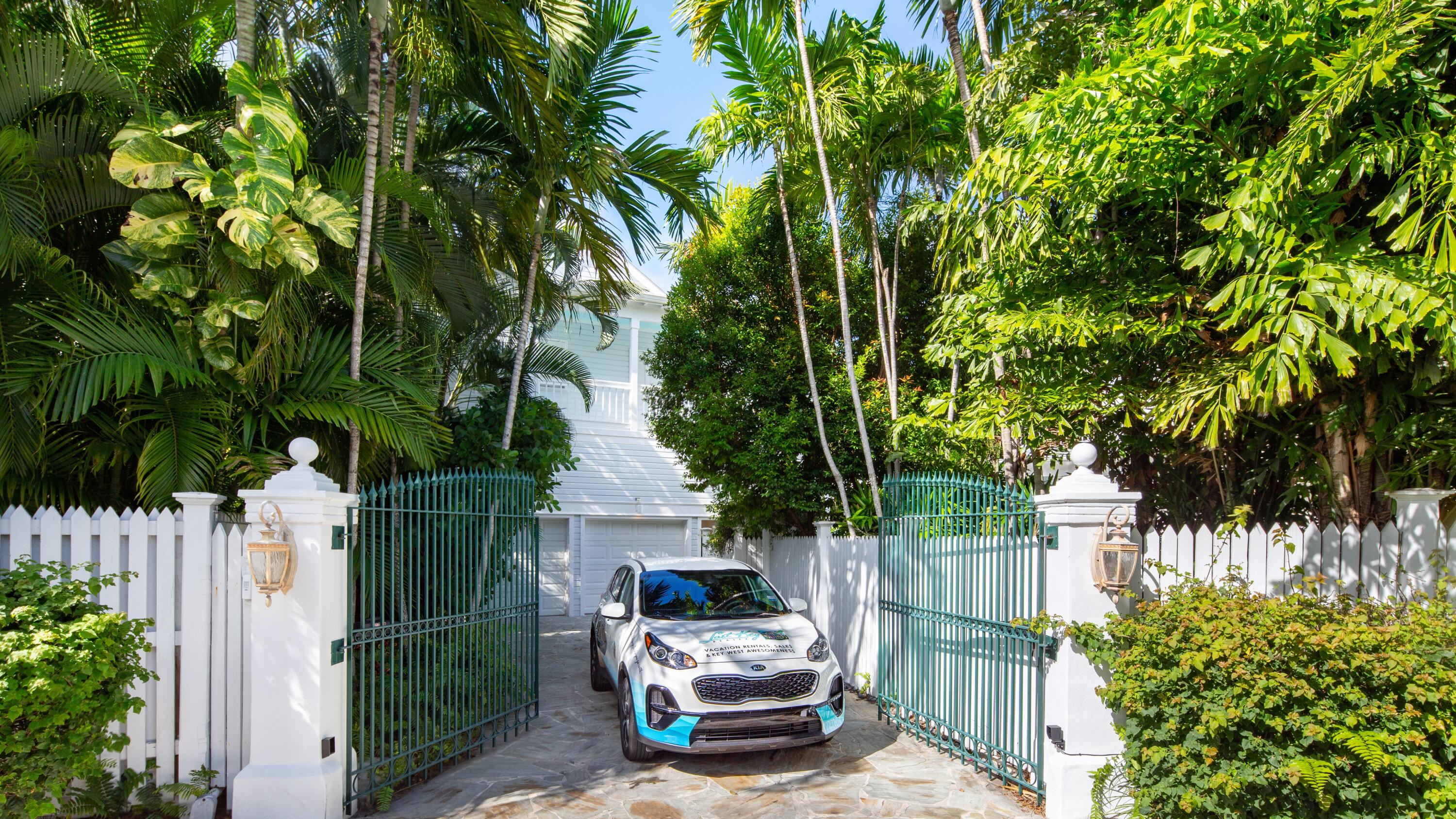 326 Caroline Street Key West, FL 33040 - Photo 46 of 47 a car parked in front of a house