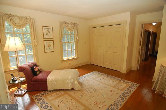 Bedroom with wooded views