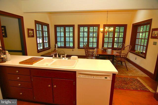 Open design with wooded views from kitchen