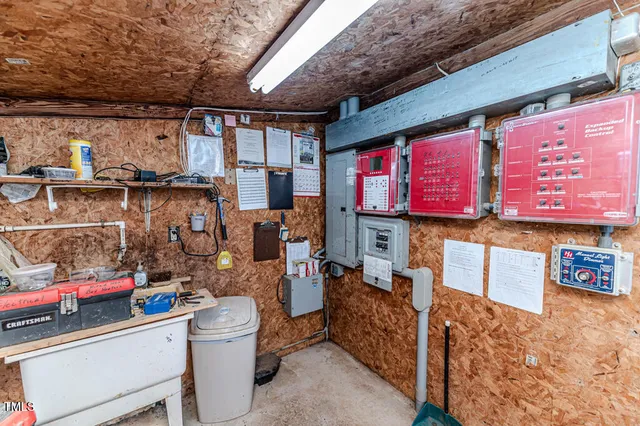 a view of a swimming pool and a yard