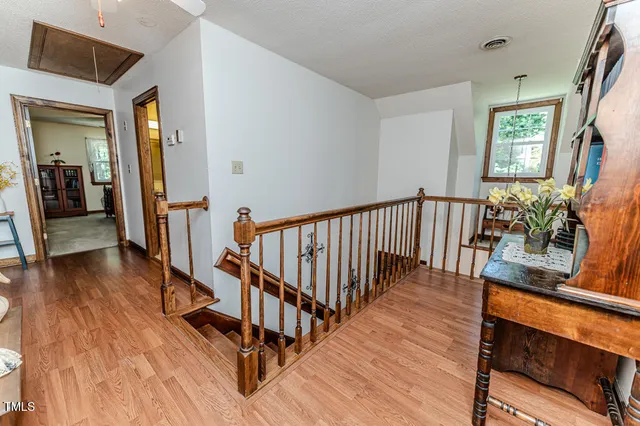 a view of a house with a small yard