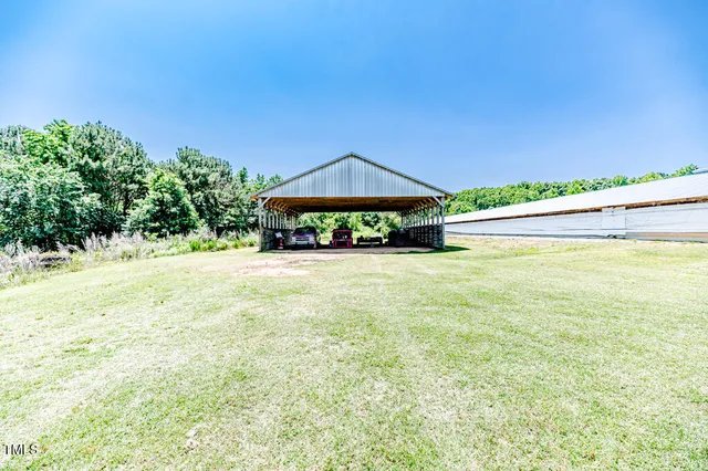 a view of a large swimming pool and outdoor space