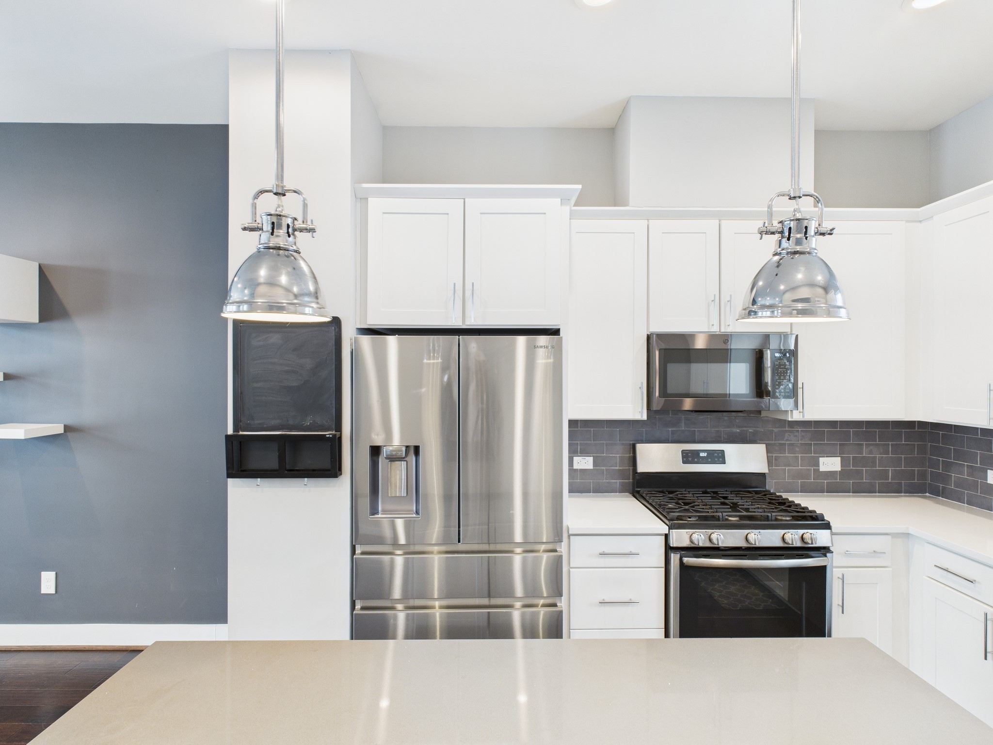 754 West Donovan Street Houston, TX 77091 - Photo 13 of 31 a kitchen with stainless steel appliances a refrigerator sink and stove top oven