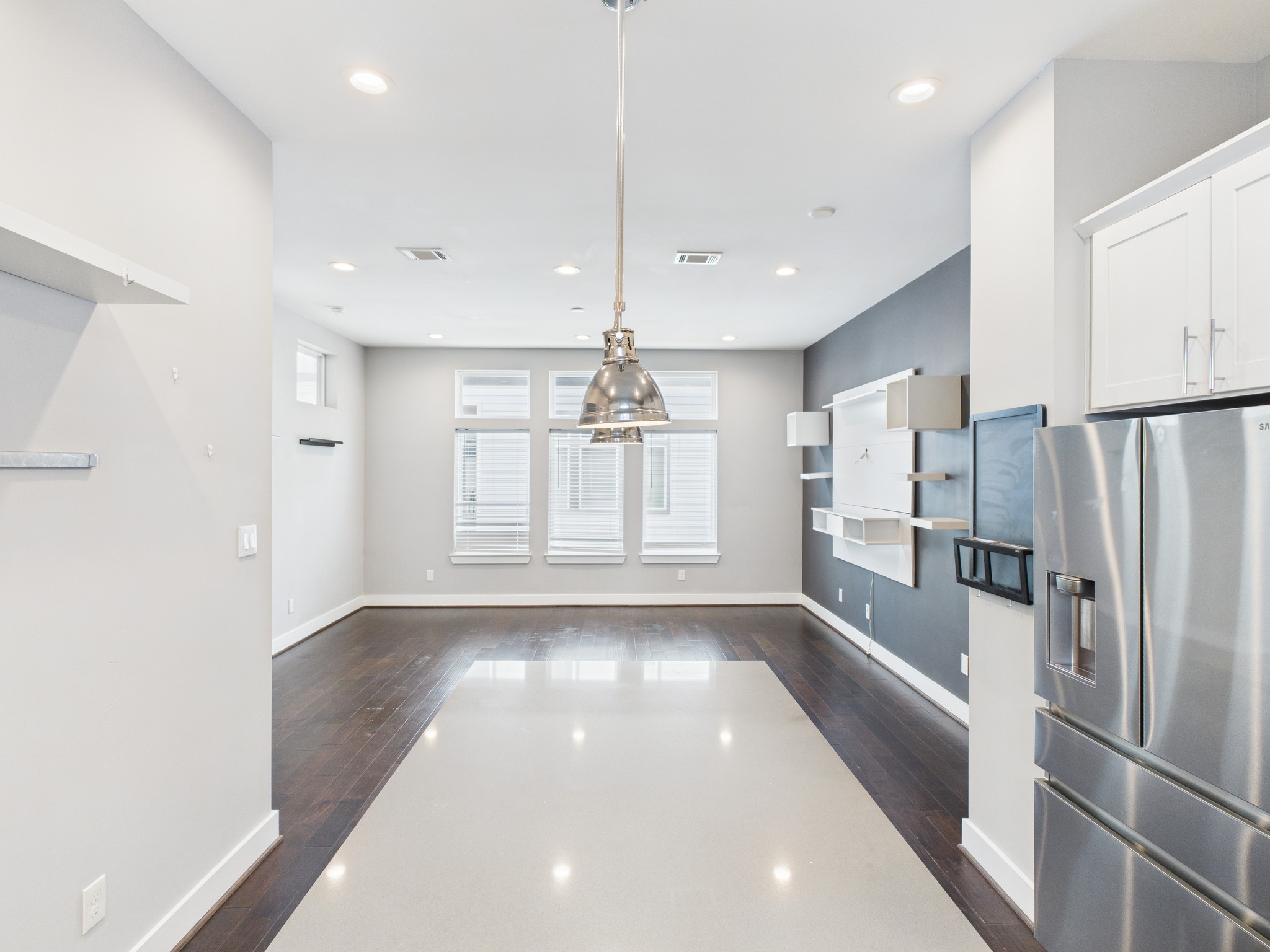 754 West Donovan Street Houston, TX 77091 - Photo 14 of 31 a kitchen with stainless steel appliances a refrigerator and a stove top oven