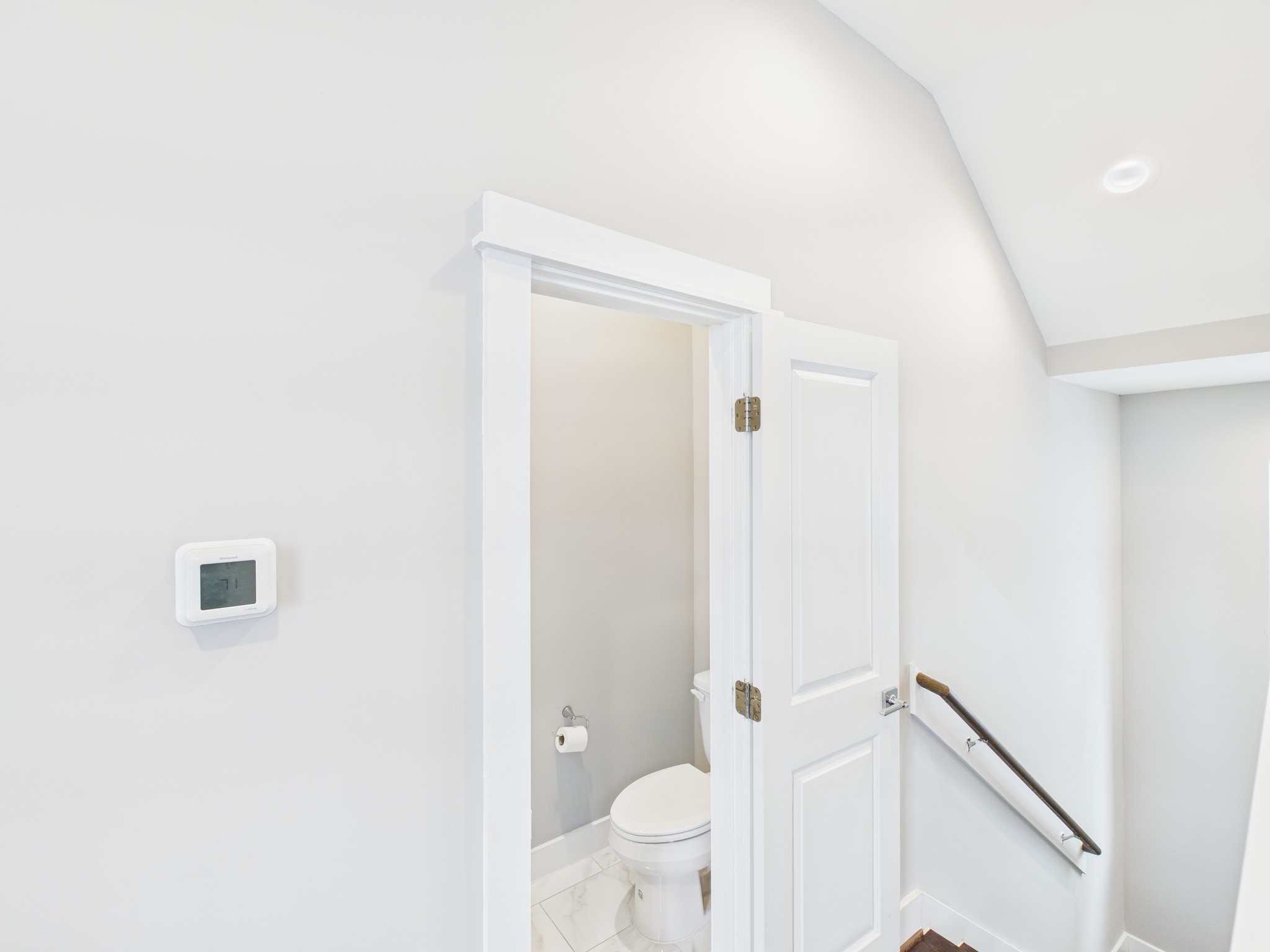 754 West Donovan Street Houston, TX 77091 - Photo 17 of 31 a bathroom with a granite countertop toilet and a shower