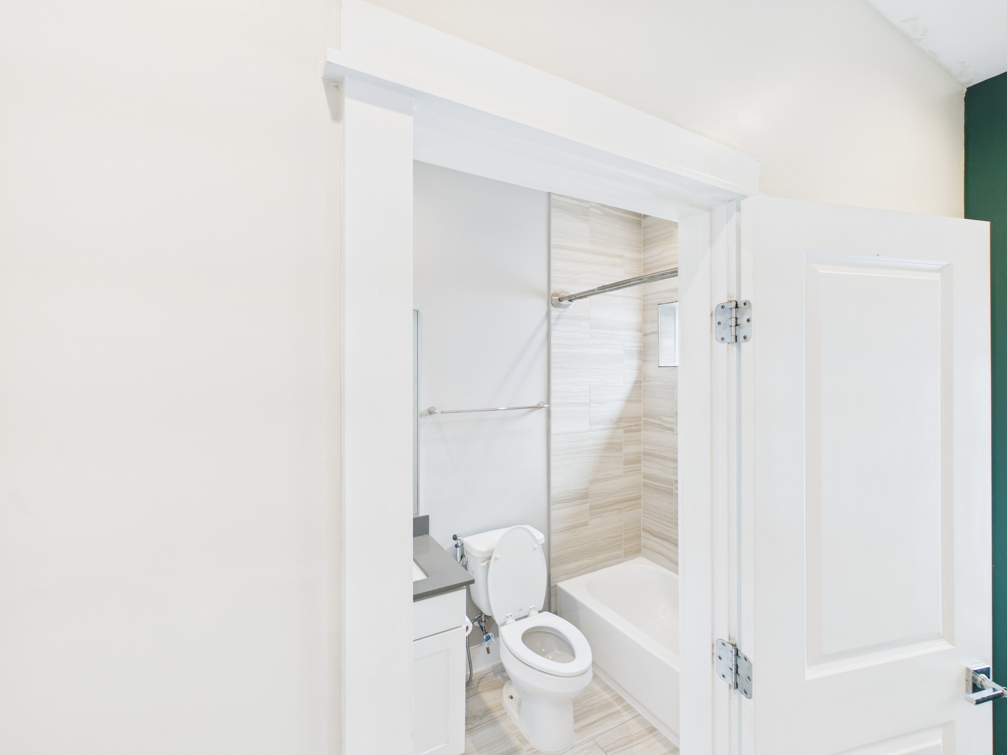 754 West Donovan Street Houston, TX 77091 - Photo 20 of 31 a bathroom with a bathtub and a shower
