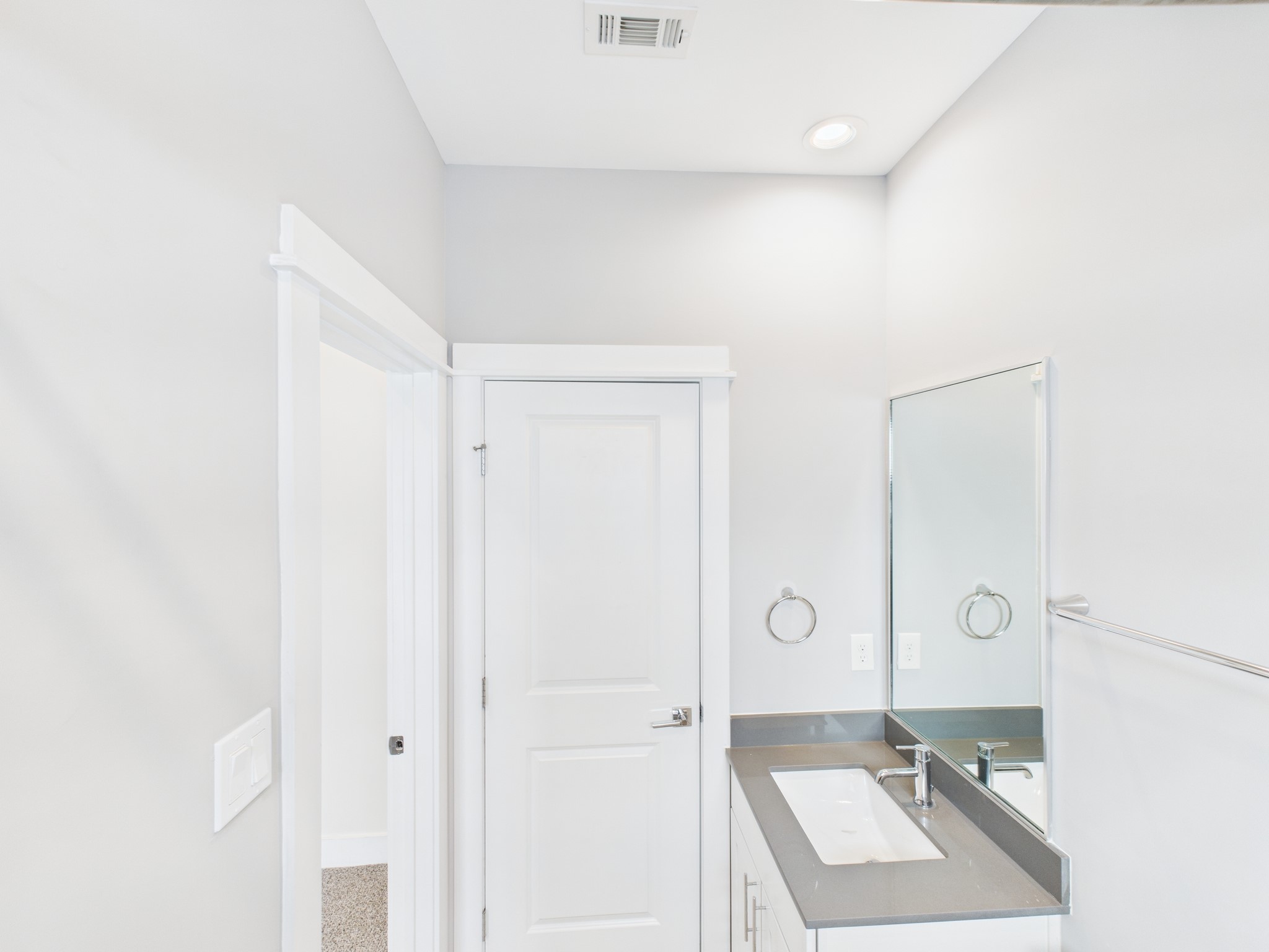 754 West Donovan Street Houston, TX 77091 - Photo 21 of 31 a bathroom with a sink mirror and a shower