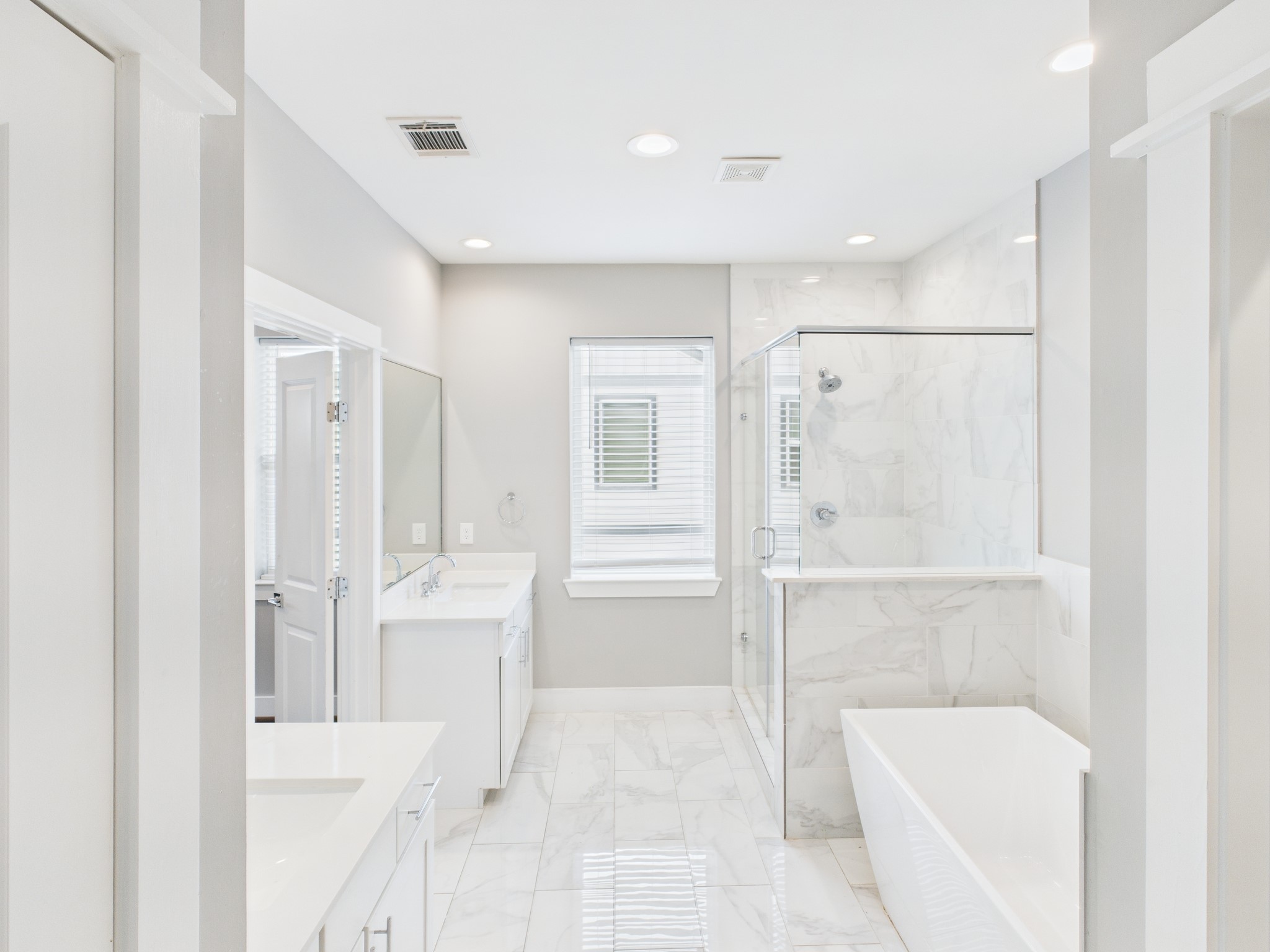 754 West Donovan Street Houston, TX 77091 - Photo 24 of 31 a bathroom with a tub shower and closet