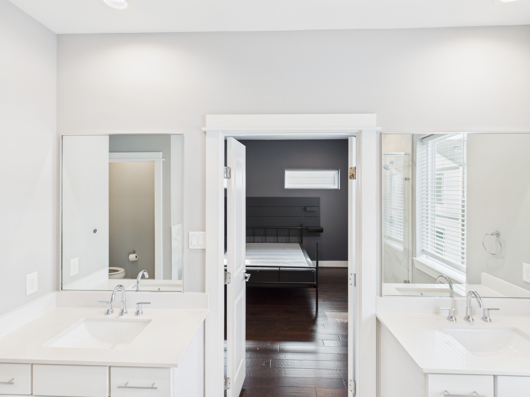 754 West Donovan Street Houston, TX 77091 - Photo 25 of 31 a en suite bathroom with a sink and a mirror