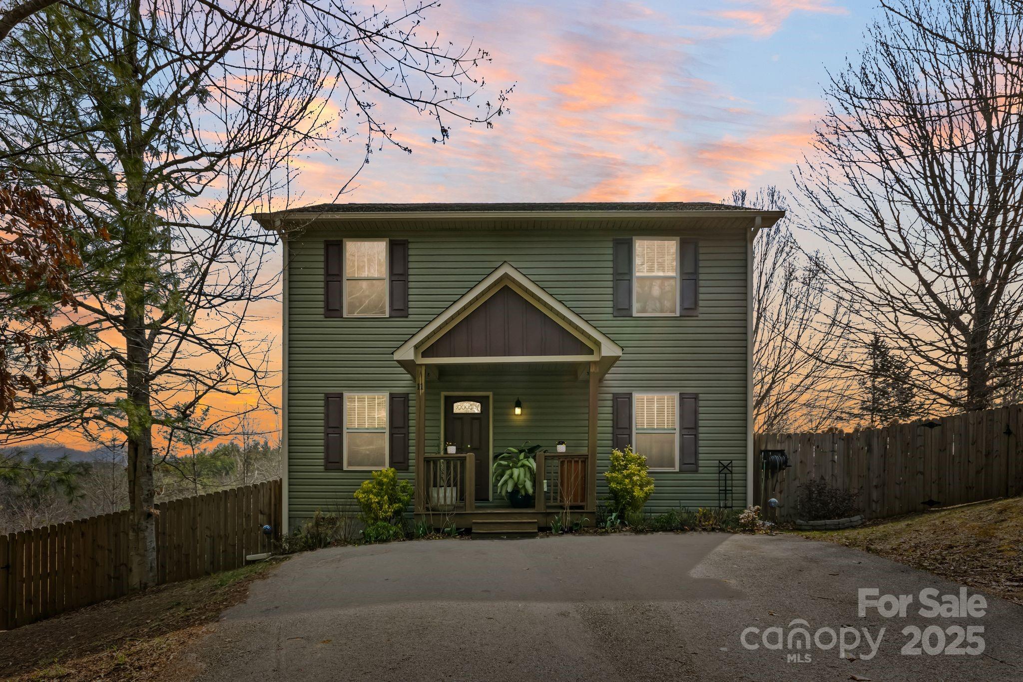 11 Mandy Lane Weaverville, NC 28787 - Photo 1 of 46 a front view of a house with garden