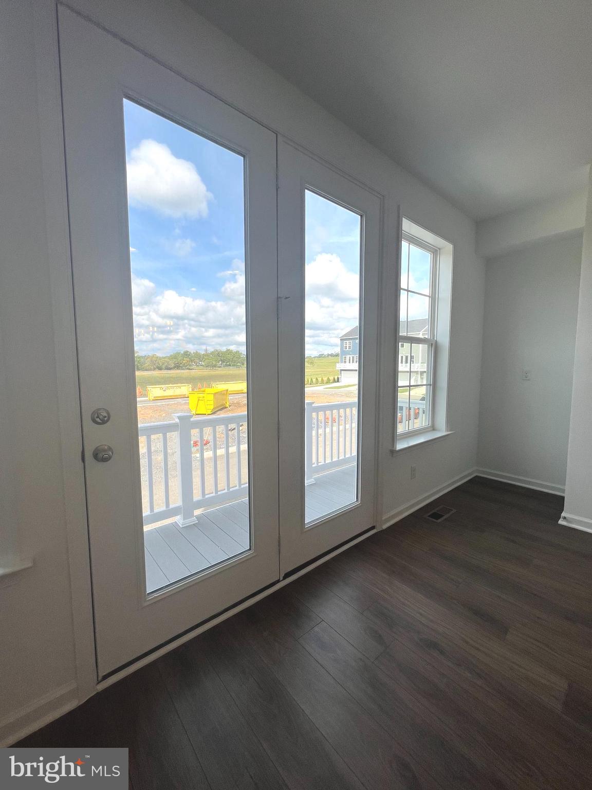 3141 Eton Place Winchester, VA 22601 - Photo 12 of 41 an empty room with wooden floor and windows