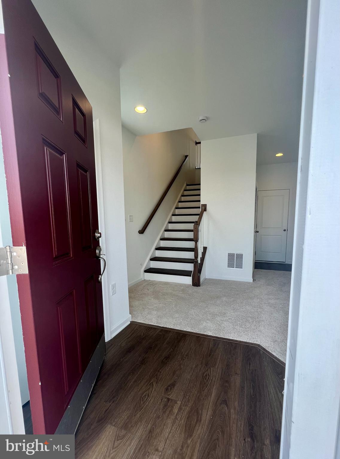 3141 Eton Place Winchester, VA 22601 - Photo 3 of 41 a view of entryway and hall with wooden floor