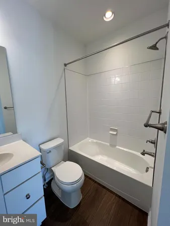 a view of balcony with wooden floor