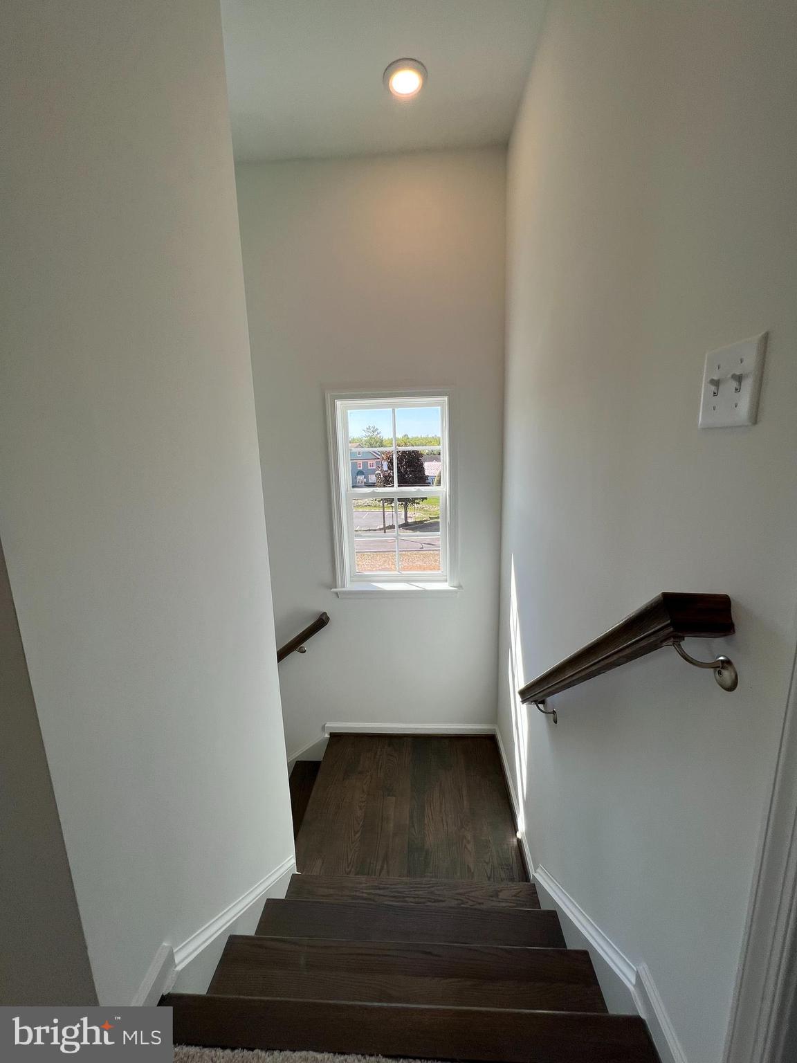 3141 Eton Place Winchester, VA 22601 - Photo 7 of 41 a view of entryway and hall with wooden floor