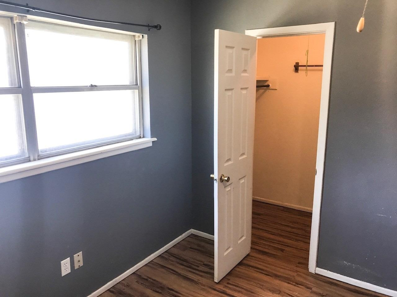 3520 Bangor Drive Lubbock, TX 79407 - Photo 11 of 11 a view of front door with wooden floor