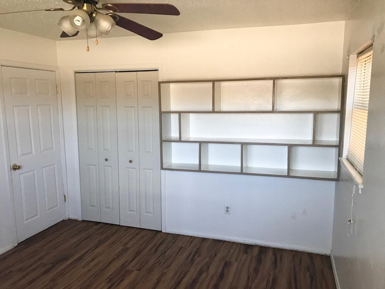 3520 Bangor Drive Lubbock, TX 79407 - Photo 2 of 11 wooden floor in an empty room