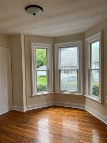 50 Swift Street Auburn, NY 13021 - Photo 5 of 25 Downstairs living room before tenants moved in