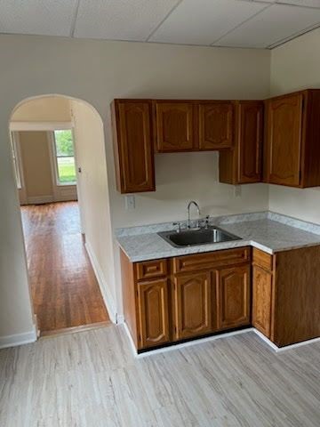 50 Swift Street Auburn, NY 13021 - Photo 7 of 25 Downstairs Kitchen before tenants moved in