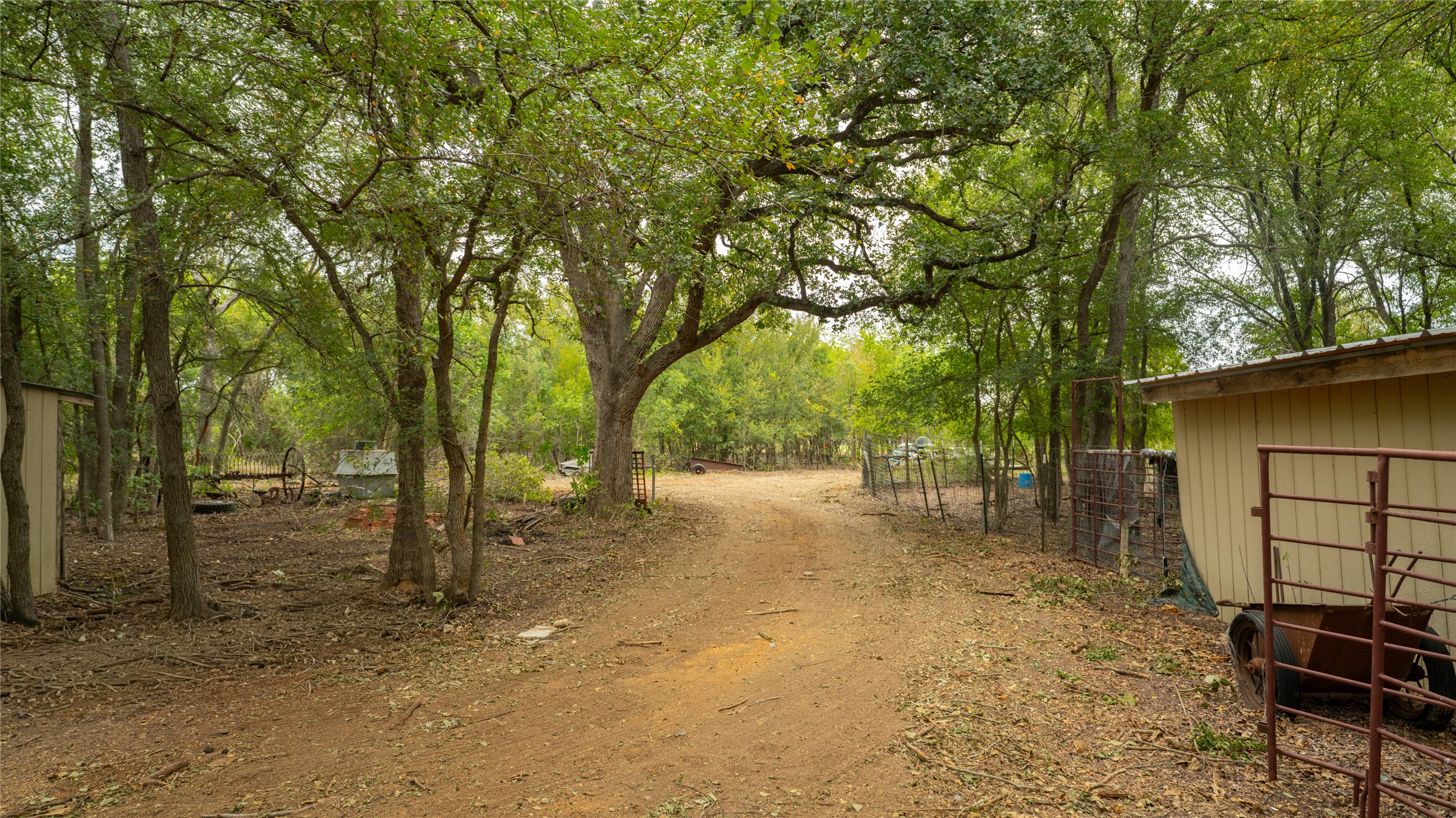 2348 County Road 404 Loop Bartlett, TX 76511 - Photo 16 of 40 View of road featuring a gated entry