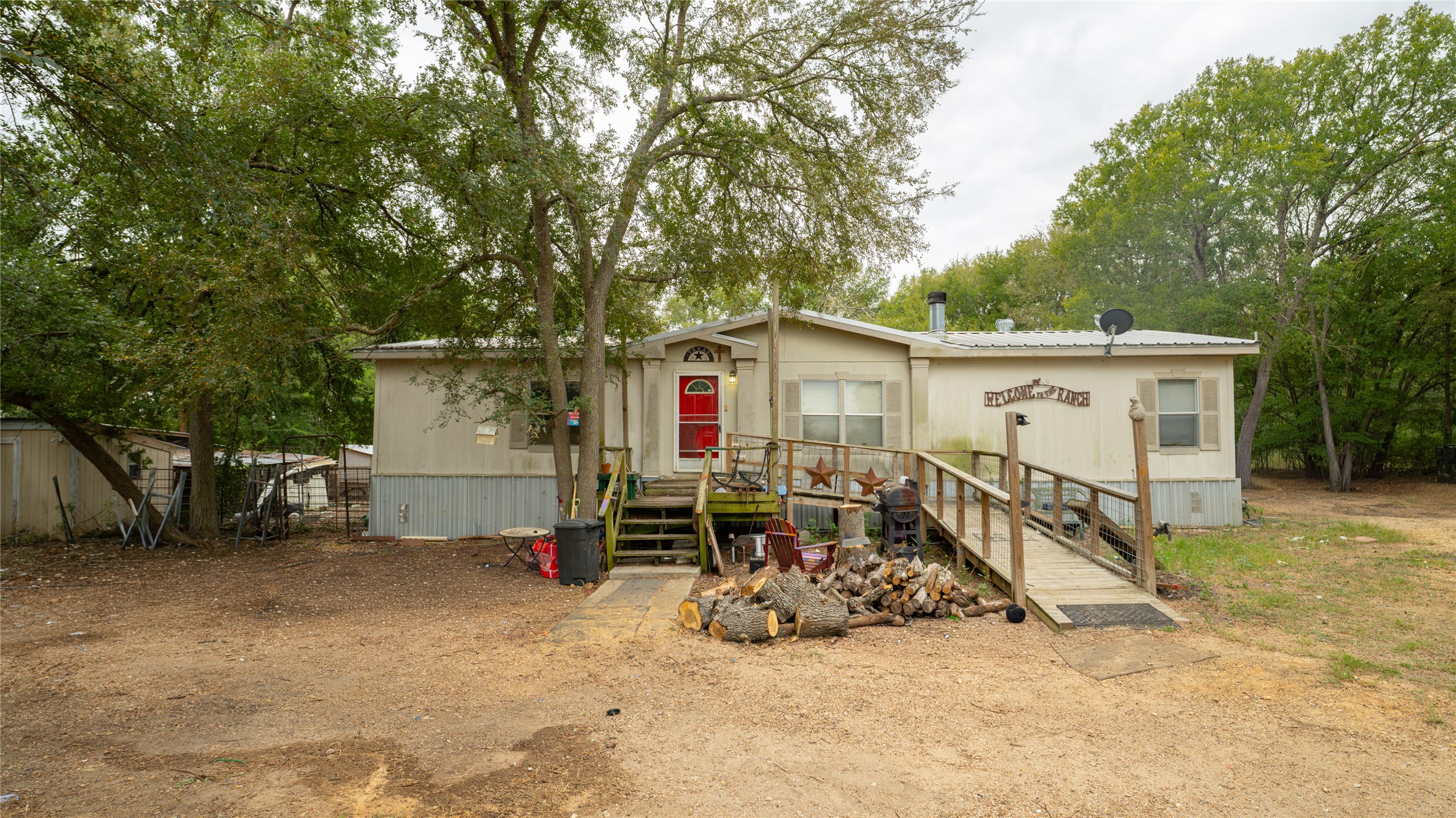 2348 County Road 404 Loop Bartlett, TX 76511 - Photo 2 of 40 Manufactured / mobile home featuring a metal roof