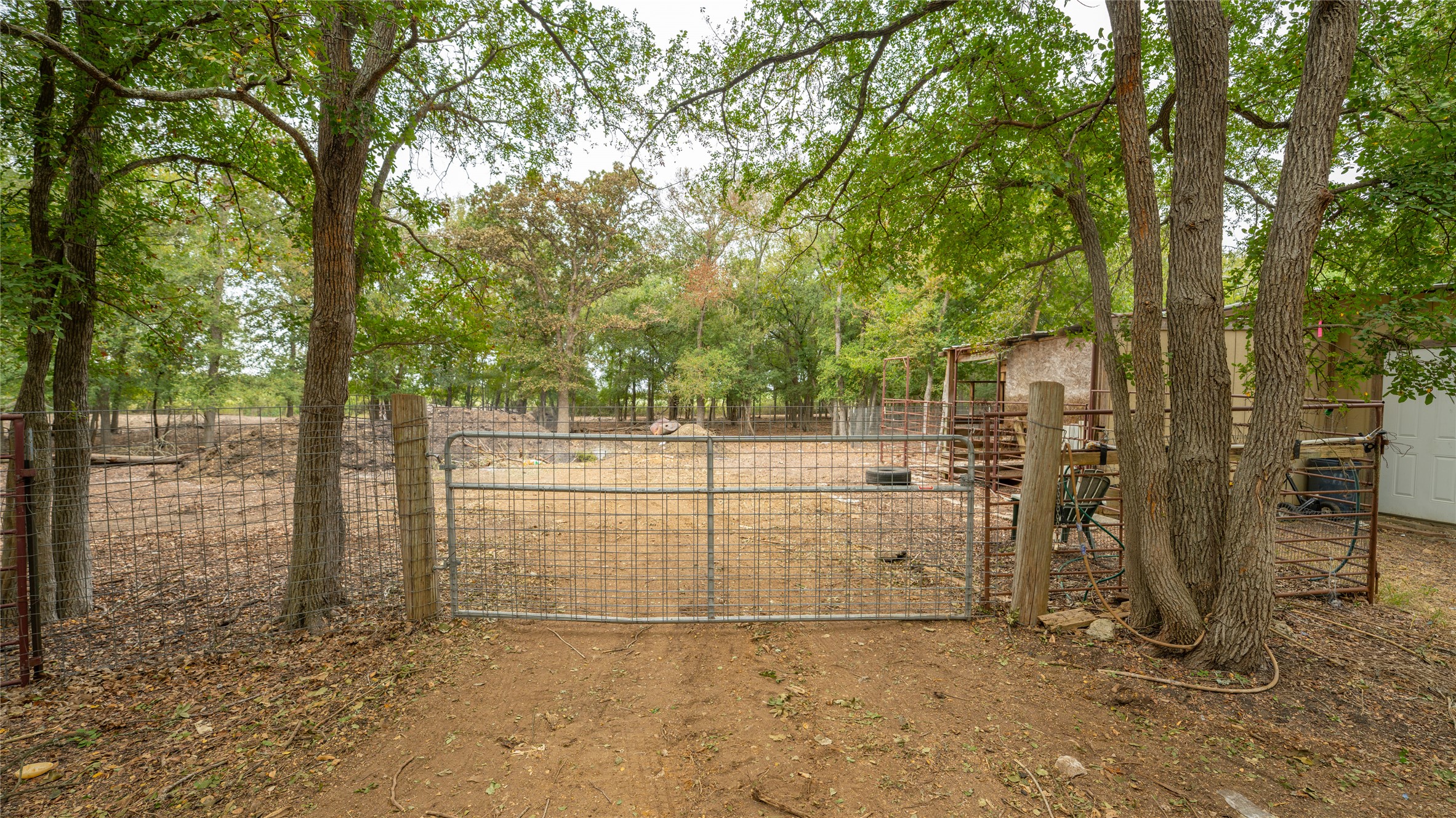 2348 County Road 404 Loop Bartlett, TX 76511 - Photo 32 of 40 Gate featuring an outbuilding