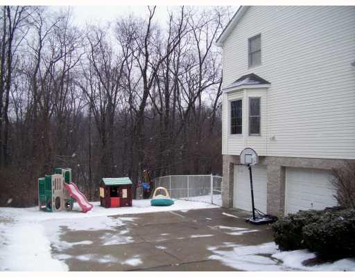 211 East Harbison Road Pittsburgh, PA 15205 - Photo 14 of 17 Exterior Front. Large Driveway and 2 Car Garage