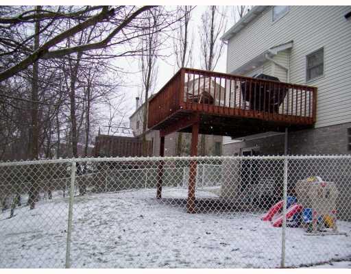 211 East Harbison Road Pittsburgh, PA 15205 - Photo 15 of 17 Exterior Back. Back of home and fenced yard, patio and deck.