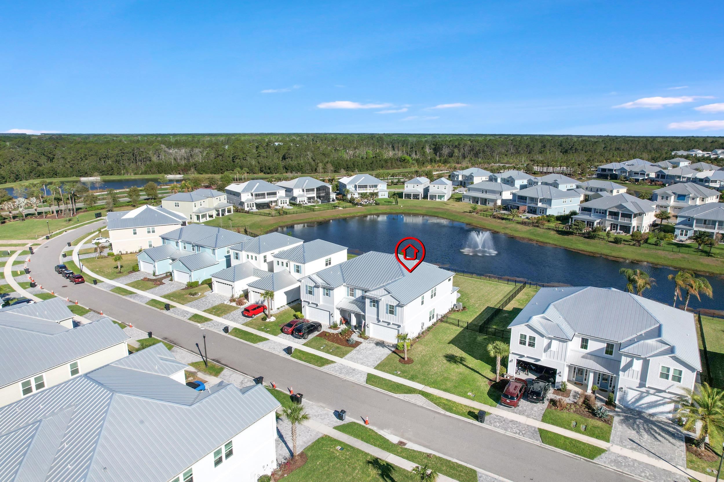 404 Rum Runner Way St. Johns, FL 32259 - Photo 2 of 41 an aerial view of a house with a ocean view