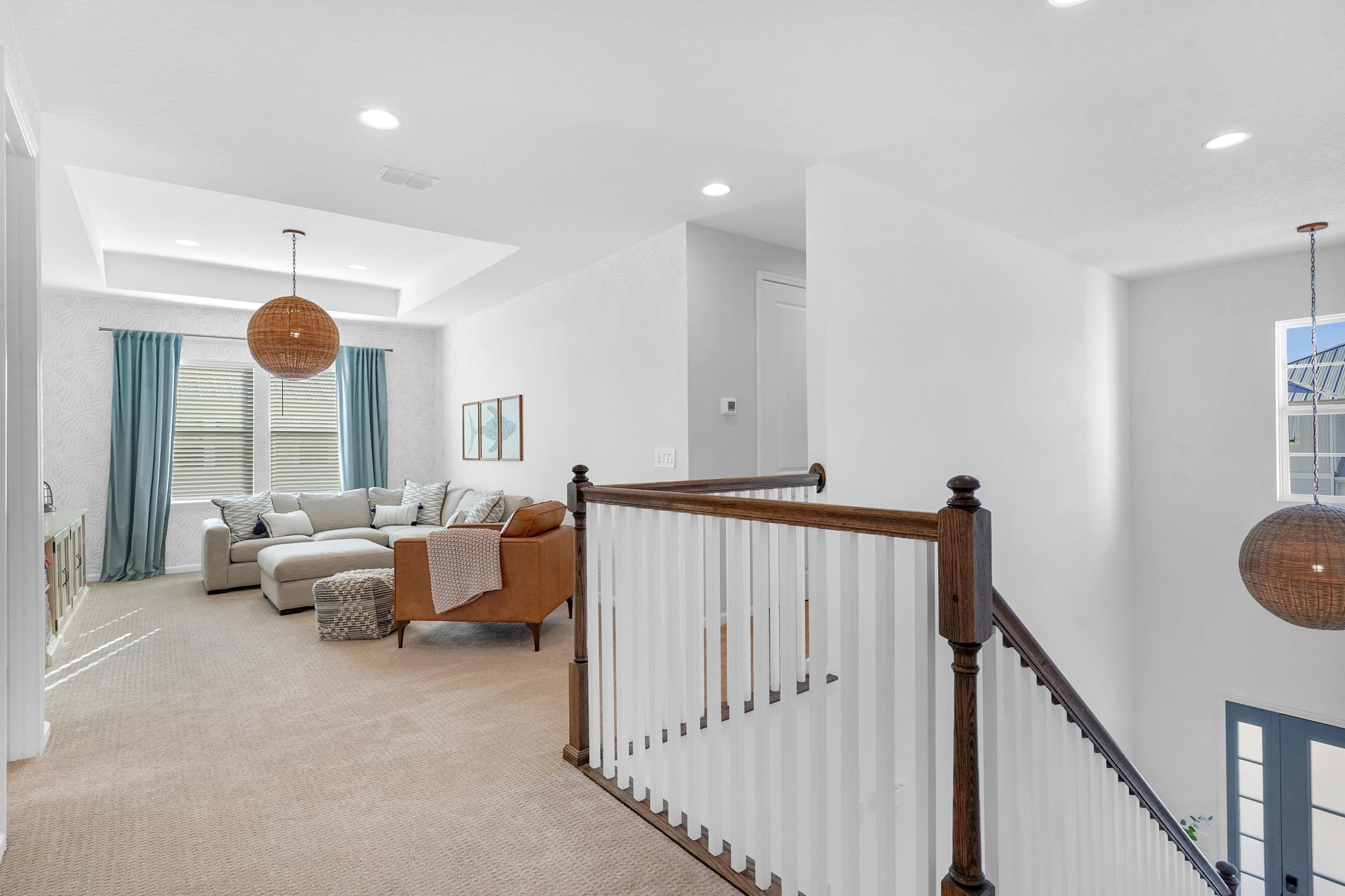 404 Rum Runner Way St. Johns, FL 32259 - Photo 21 of 41 a view of a livingroom with furniture and staircase