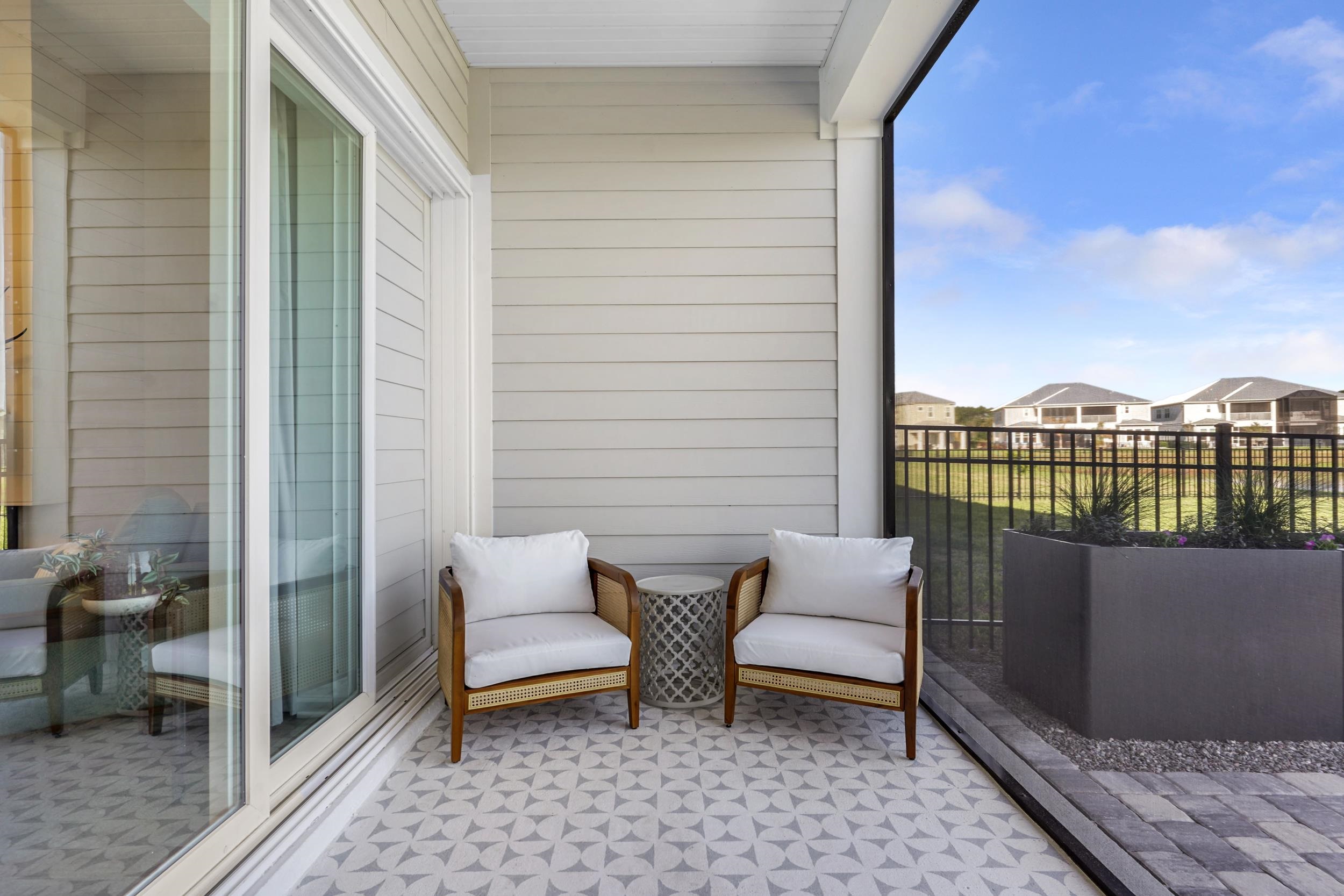 404 Rum Runner Way St. Johns, FL 32259 - Photo 34 of 41 a balcony with furniture and city view