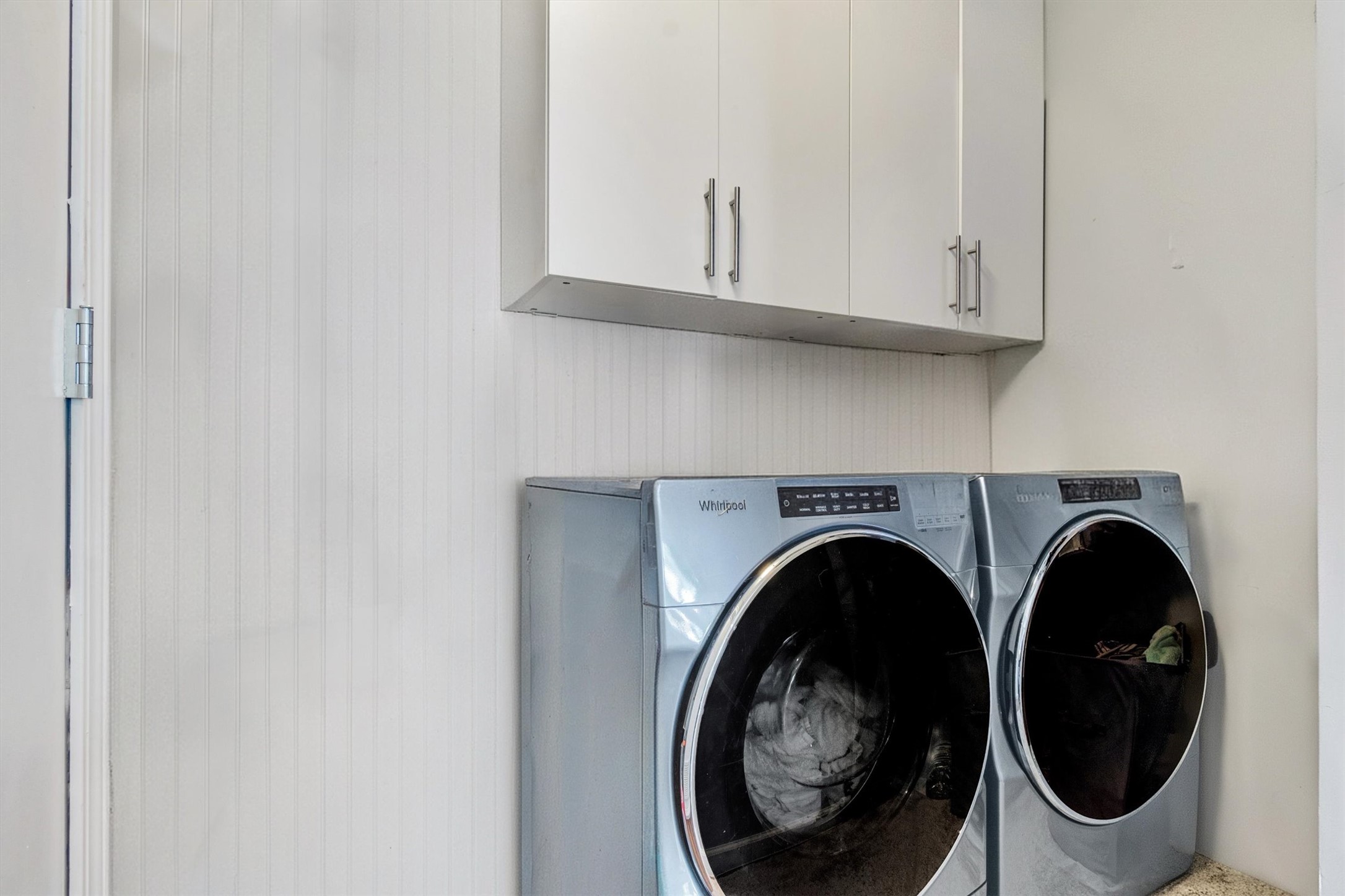 8800 Redfield Lane Austin, TX 78758 - Photo 18 of 27 Full-size indoor laundry room for everyday convenience.