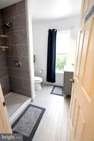 a bathroom with a sink and a toilet