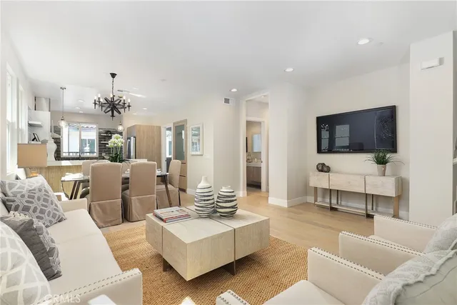 a kitchen with stainless steel appliances a refrigerator and a sink