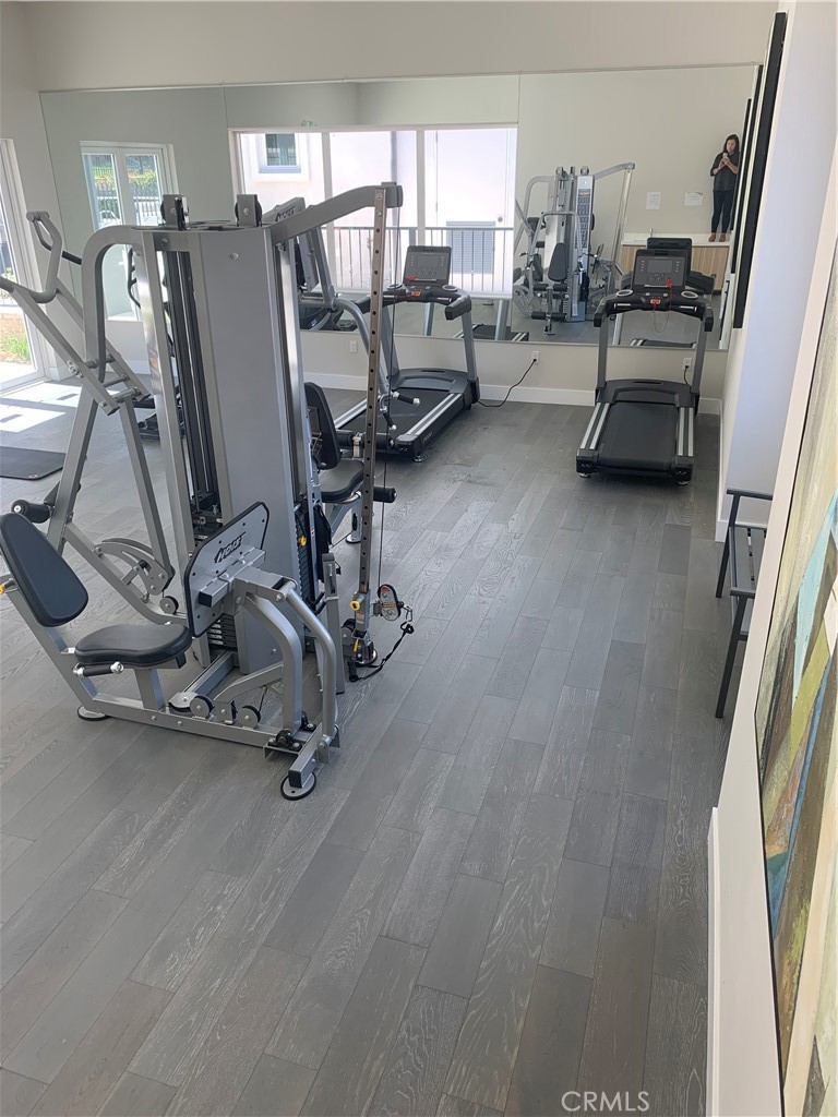 8 Brookline Way Phillips Ranch, CA 91766 - Photo 62 of 63 a view of a room with gym equipment