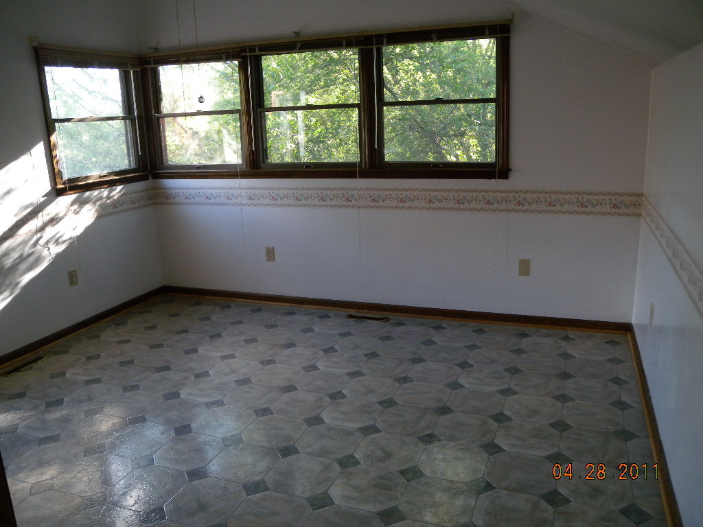 2154 Burkette Road Elliston, VA 24087 - Photo 5 of 6 an empty room with a window