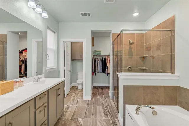 a view of a kitchen from the hallway