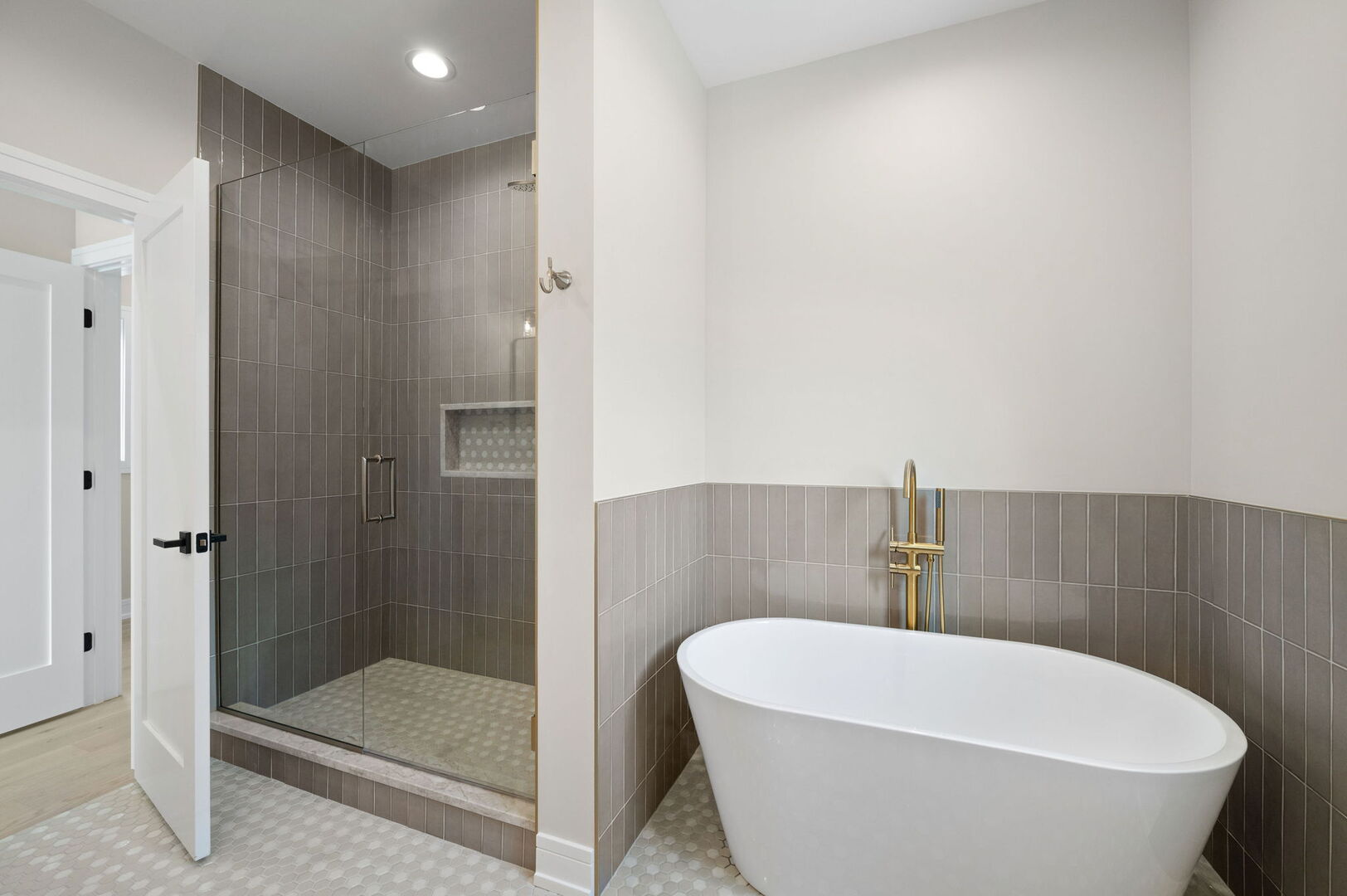 5825 West Byron Street Chicago, IL 60634 - Photo 14 of 33 a white bath tub sitting in a bathroom