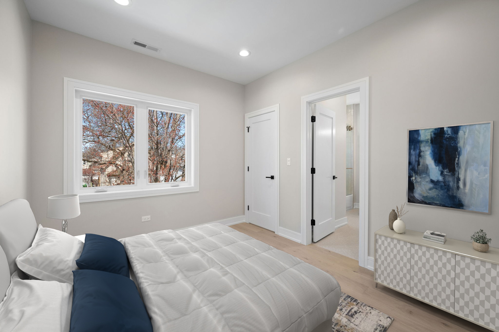 5825 West Byron Street Chicago, IL 60634 - Photo 16 of 33 a bedroom with a bed and a window