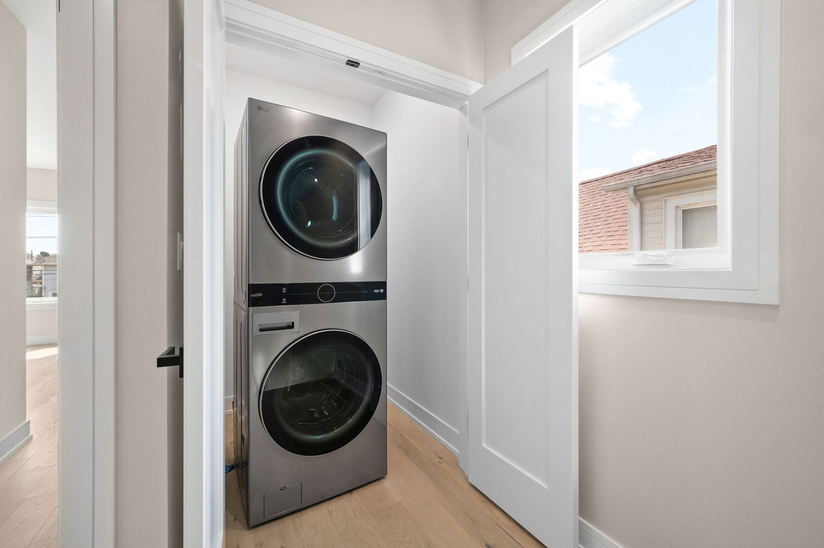 5825 West Byron Street Chicago, IL 60634 - Photo 19 of 33 a view of a hallway with washer and dryer
