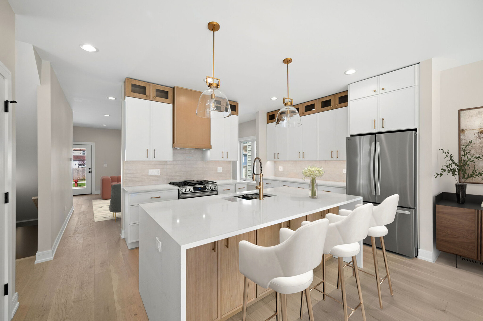 5825 West Byron Street Chicago, IL 60634 - Photo 8 of 33 a kitchen with stainless steel appliances kitchen island granite countertop a table chairs and a refrigerator