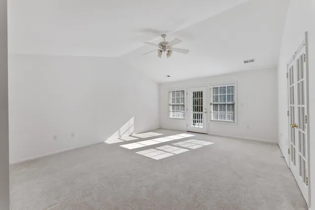 an empty room with windows