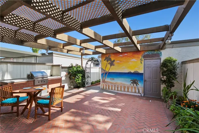 a view of a chairs and tables in patio