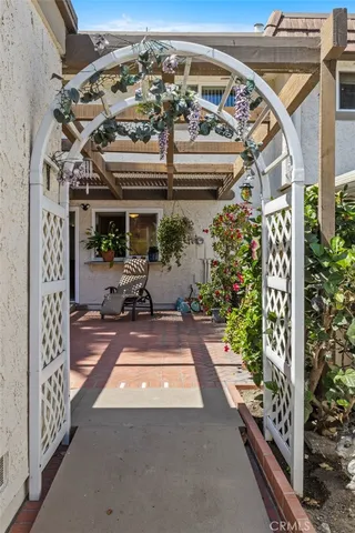 a outdoor space with lots of furniture and plants