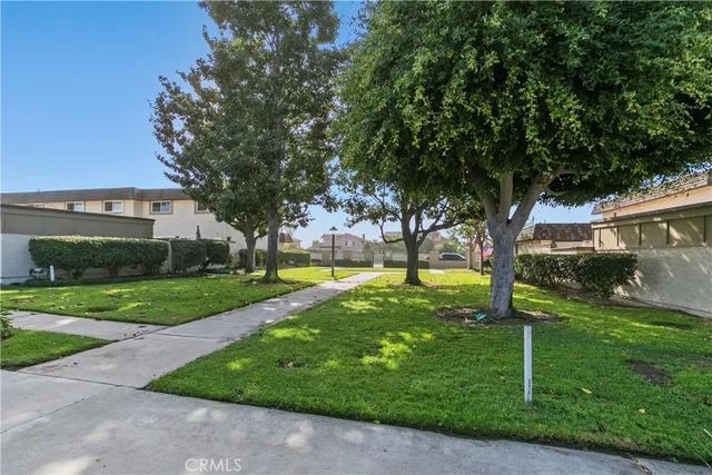 a view of swimming pool with chairs