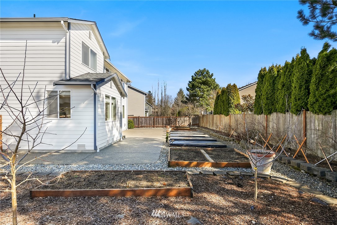 6205 Northeast 4th Court Renton, WA 98059 - Photo 22 of 22 a view of a patio with a table and chairs