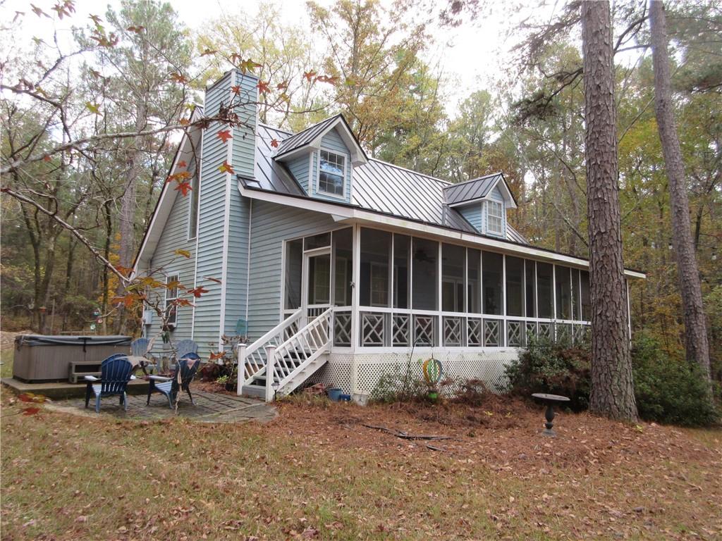 a house with trees in the background